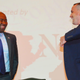 In this Sept. 8, 2016 photo, South Carolina Democratic Party Chairman Jaime Harrison and his GOP counterpart, Chairman Matt Moore, laugh after a recent voter education forum in Florence, S.C. Harrison has now announced his candidacy to unseat GOP Sen. Lindsey Graham of South Carolina in 2020.